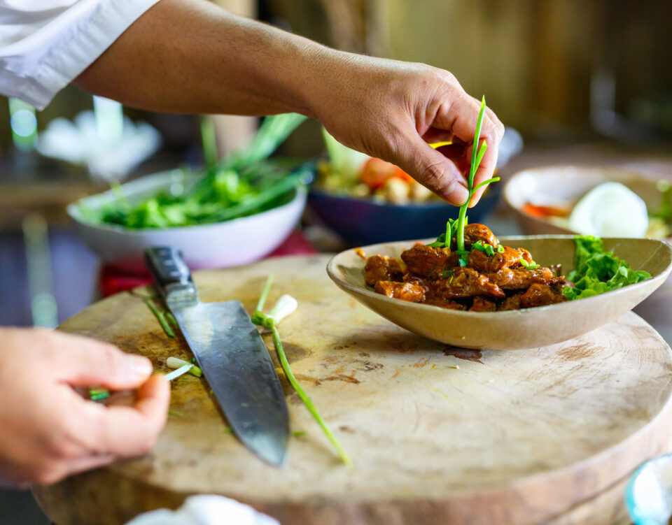 Chef,Making,Traditional,Cambodian,Meat,Dish,At,Cooking,Class